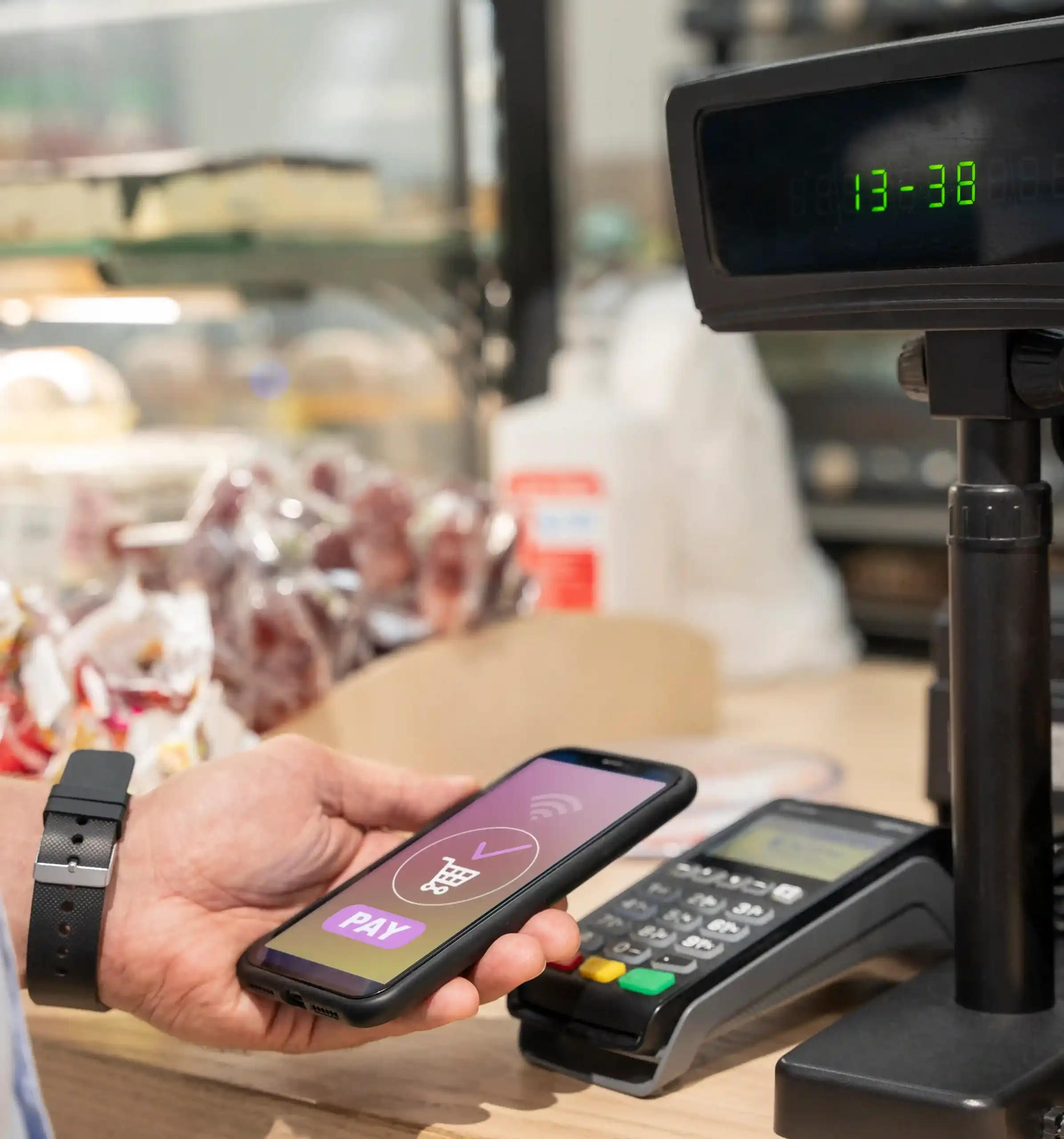 Contactless payment using a smartphone at a retail checkout with a POS terminal